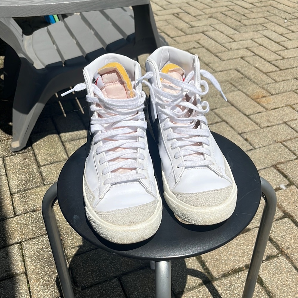 Women’s Nike blazers.